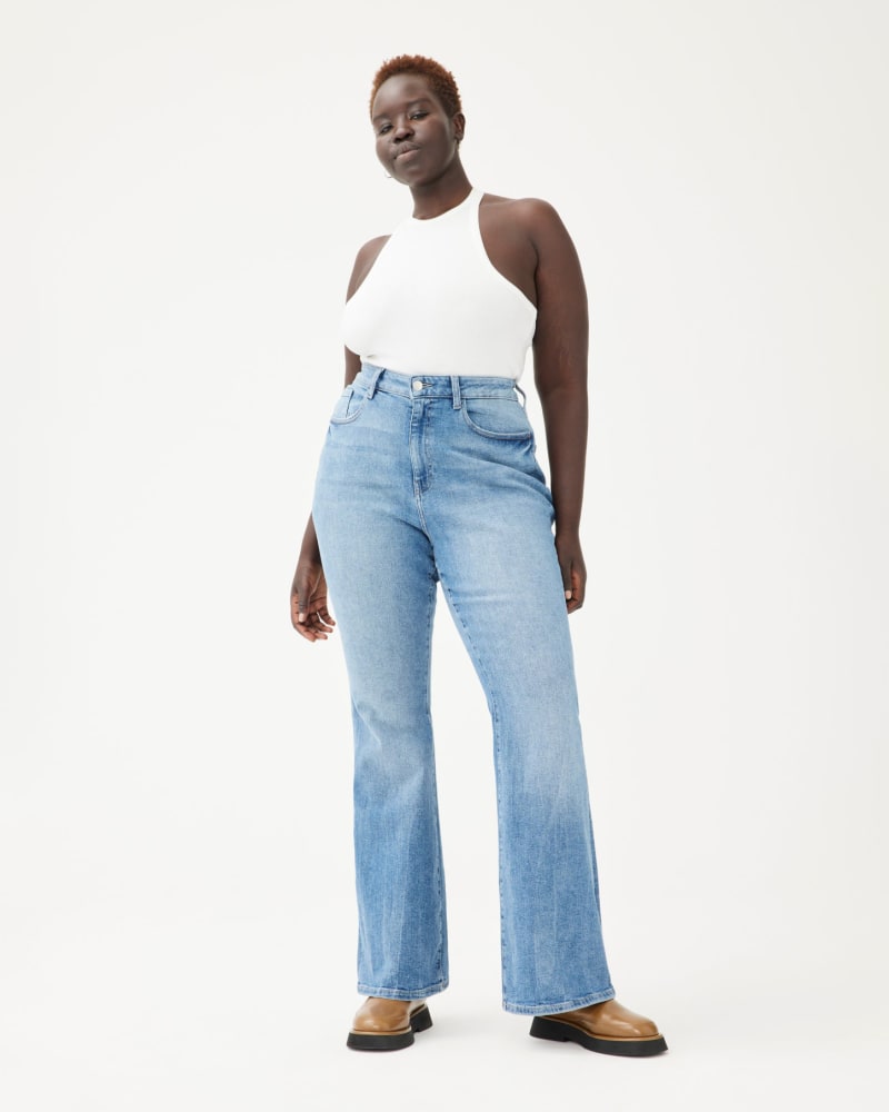 Front of a model wearing a size 16X33 MIA PLUS - HIGH RISE FLARE | SMITH in SMITH by Warp + Weft. | dia_product_style_image_id:293013